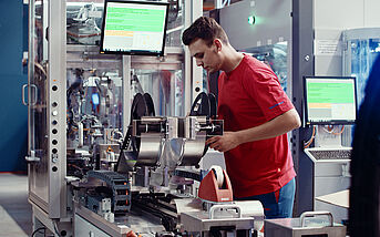 Rosenberger Apprentice working on a machine